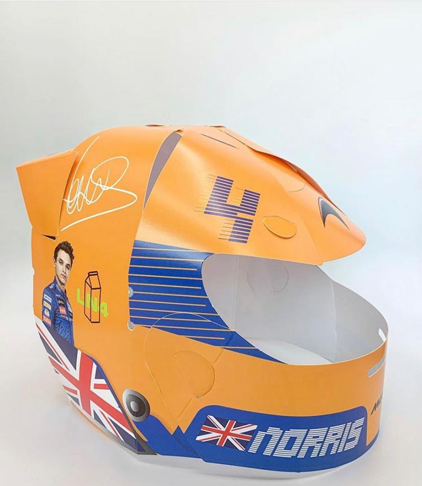 Pop_upmarketing's tweet photo. We had a blast creating this McLaren helmet for their #WeRaceAsOne campaign. All McLaren merchandise proceeds will go to charities across the world helping those most affected by the #covid19 crisis. #McLaren #landonorris #carlossainz @McLarenF1 https://t.co/eg3Rdfkp43