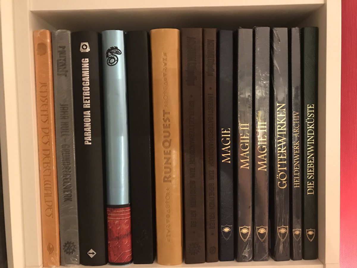 RPGDeluxe's tweet photo. My shelves in detail - Day 38: mainly German deluxe limited edition books.  Blue #DSA5 special editions. #AchtungCthulhu #Myranor #MutantYearZero @SilentPat @pegasusspiele #Shadowrun #RuneQuest Gold Edition and one nice French book @EdSansDetour #Paranoia https://t.co/QXcBduxp6y