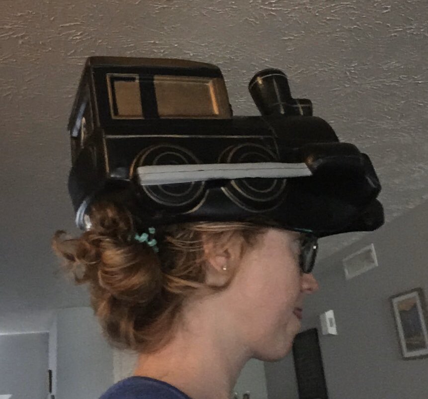 capcomconrad's tweet photo. Commandering the dining room table for the first full day of hands-on activities @USNASTEMCenter #SETSail2020 ! It’s also Crazy Hat Day, so representing @LifeAtPurdue ! #Boilermaker #STEMedu #lifelonglearner https://t.co/CNwfWz2EOw