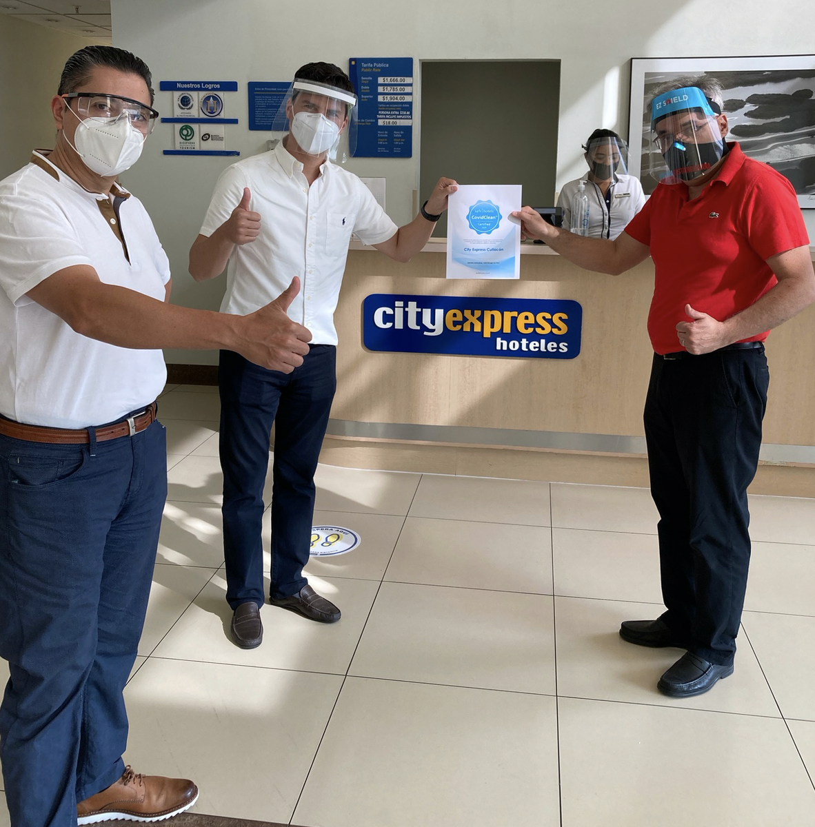 Safehotels's tweet photo. 34 Hoteles City Express properties across Mexico and Colombia have now earned the CovidClean™ seal of approval!  

Safehotels’ Mauricio Tommasi presents the CovidClean™ certificate to Francisco Arias and Rogelio Frias - both at Hoteles City Express. https://t.co/5mQjpvzoP4