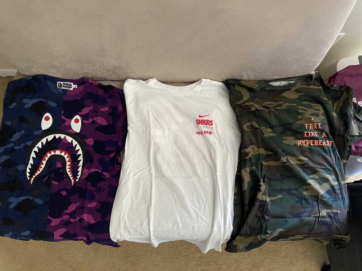 Kupidrewskii's tweet photo. Pre-College Cleanout (2/2) 
Ksubi History (M but fits almost like a dress)
Gucci long sleeve (M but runs small)
CDG Play blue eyes (L but runs small)
Bape shark split camo (M but runs small)
Snkrs ATL (L)
Qias Qrew Sneakercon ATL 2016 (M)
Nike hooded zip-up windbreakers (M) https://t.co/CKV2FROPR3