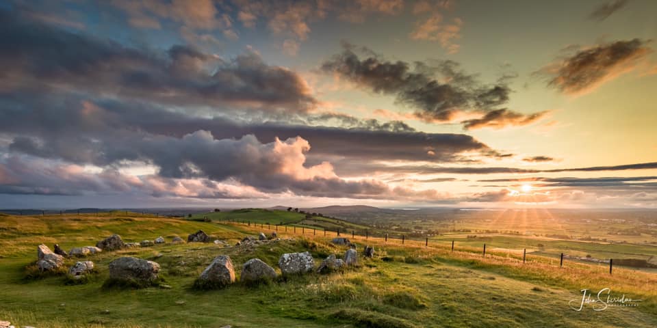 DiscoverBoyneV's tweet photo. Today for 'Beauty of the #BoyneValley' we have a stunning sunset at Loughcrew Cairns by John Sheridan Photography. Theis prehistoric site has recently reopened; have you visited the Hill of the Witch yet? #MakeABreakForIt #staycation 
https://t.co/JSrwUXf2uv https://t.co/sq1iN1hddm