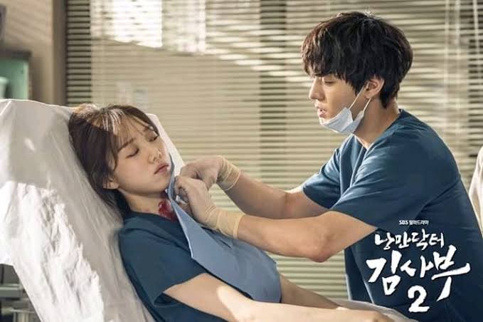Reasons to love Dr. Romantic Kim Sabu 2:1. Less romantic scenes than season 1 because Woojin is a tsundere boy who was creating 'a line' to himself as a reminder for not crossing it for sake of not losing his loved one. I like him better than Dongjoo in S1 who was bucin af 