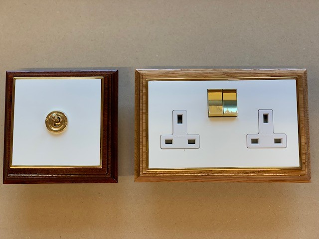 Oliver's can now unveil our latest creation:  
ASPIRE.
this range of contemporary sockets and switches is available with a flat white plate/brass switches and pin stripe edge. These will be available in the full range on our traditional oak/mahogany patresses.