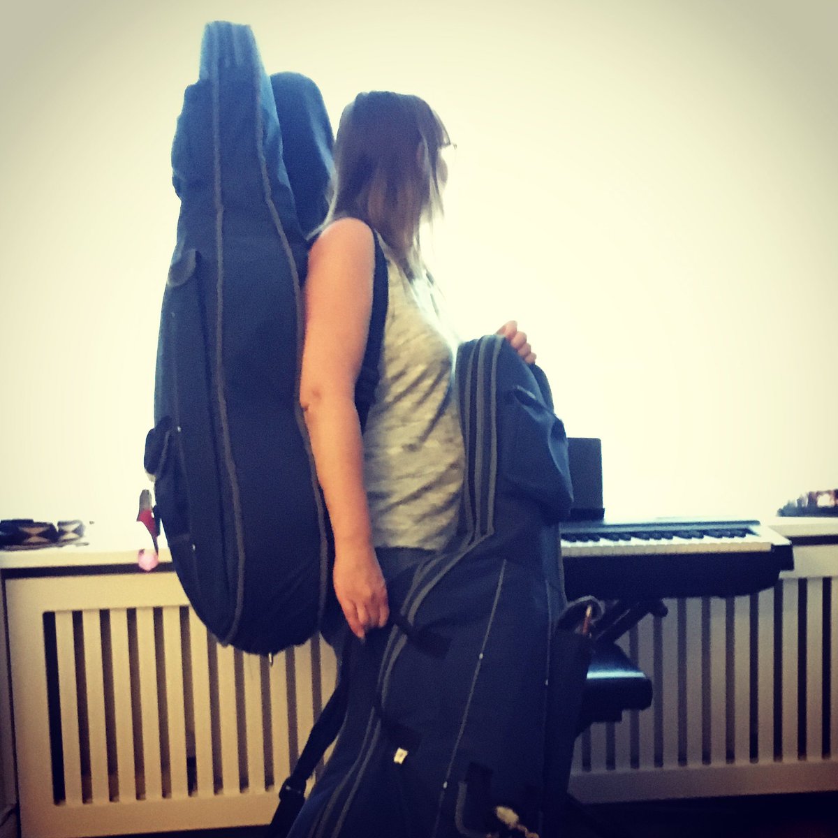 NicolaHoughton_'s tweet photo. Are those angel wings? Nope, just cellos...just the three state school compulsory cellos we’ve been sharing our home with during lockdown. Waiting for school to ask for them back 😂 #homeschooling #endofterm #middleclasschildren 🎻🎻🎻 #lockdown #mumof3 #tooting https://t.co/EN4oEa1exd