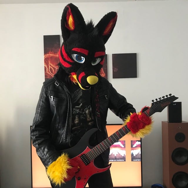 This is Daxxy! He loves playing the guitar! 
I made this suit several years ago.

#fursuitmaker  #fursuit #furry
