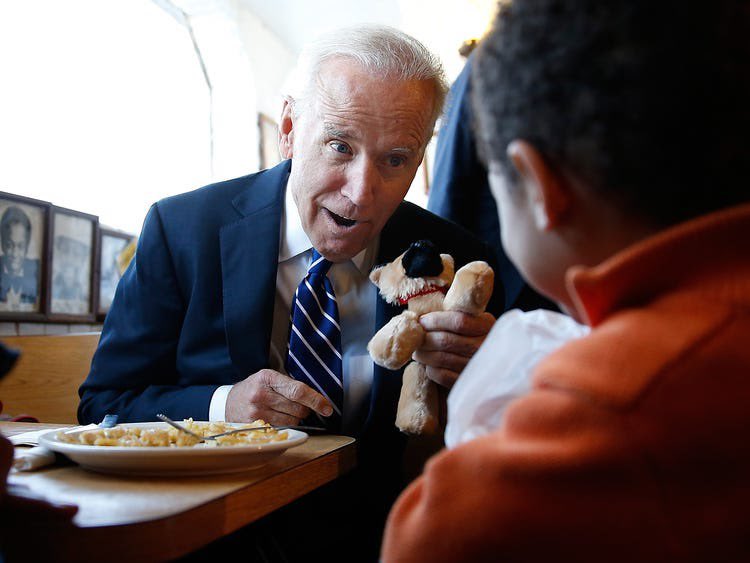 jeneps's tweet image. Just recalled that during the Obama administration, Joe Biden would give out stuffed animal dogs that look like his dog Champ. In these three photos, he’s giving them to the very young and very old.