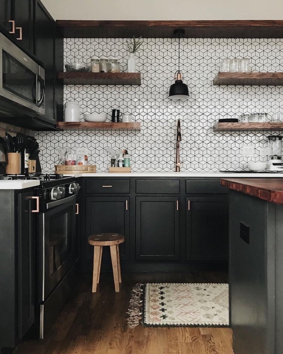 Who here has a secret (or not so secret) love for black kitchens? We absolutely love a clean, white kitchen, but its fun to step outside of the box too!

#blackkitchencabinets #black #kitchenremodel #backsplash #wood #dreammaker #bathandkitchen