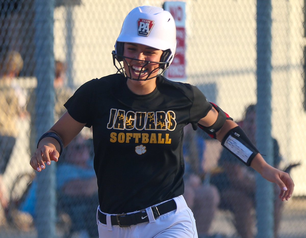 MikeDarnay's tweet photo. Jaguars FP C Mackenzie Zang smiles while making her way to home plate after hitting a home run against Perryopolis on Jul. 14, 2020 during the Mon Valley Independent Senior Swing Softball Tournament. https://t.co/b4HLjsnVJt