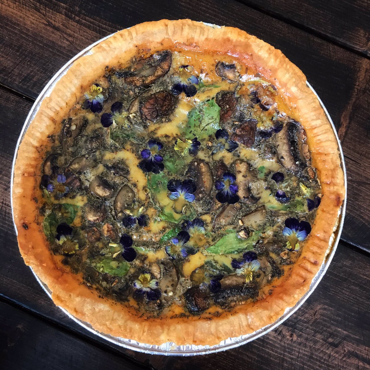🧐 We wondered how well our wild pansies would hold up in the oven so we tossed them on this quiche at 350F for 45 minutes. A little rustic but I like it that way! 👨🏽‍🍳

🌼Get your wild pansies and mixed bags of other edible flowers today! 🌺

#ygkfarmtotable #kingston_on #ygk