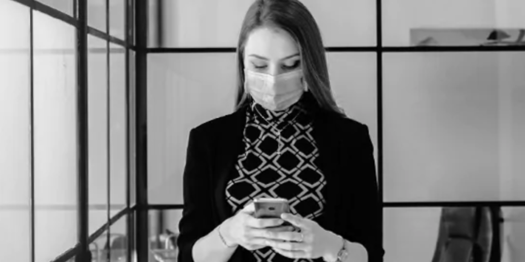 woman in mask at work