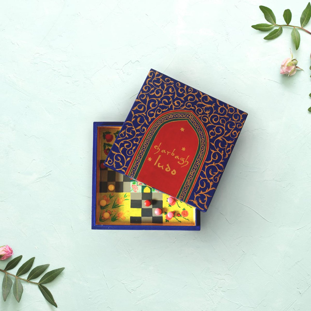 Ctok10's tweet photo. Charbagh Ludo-board game inspired by floor plan of beautiful #MughalGardens. d design speaks of various elements of Mughal garden in kashmir like d blooming flowers,d pathways nd d fountains.#CTok_KashmirDairies #CommitmentToKashmir #PapierMachieNaqaashi #ProductDesign#HandSkill https://t.co/Uw8fZ6NHuI