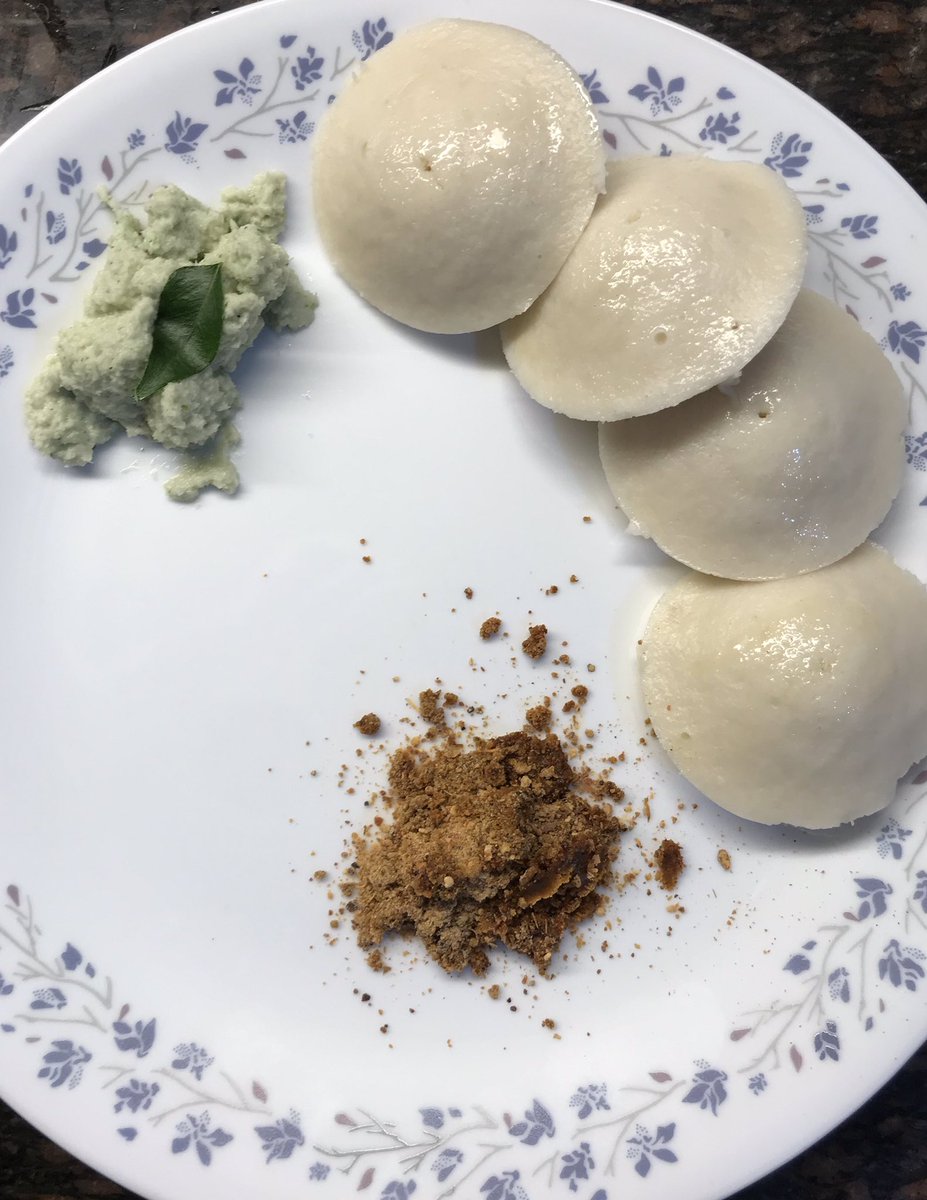  #BreakfastClub Huge South Indian cuisine day at our pad. We guys are cooking, shooting recipe videos & eating through from Breakfast to Lunch. Starting with these soft soft Idlis, with spicy  coconut  chutney & Podi with ghee. 9.98077/20  #FoodieTwitter