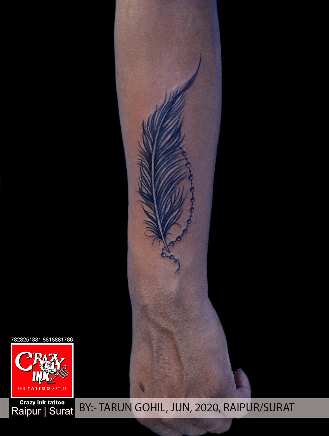White Ink Feather Wrist Tattoo