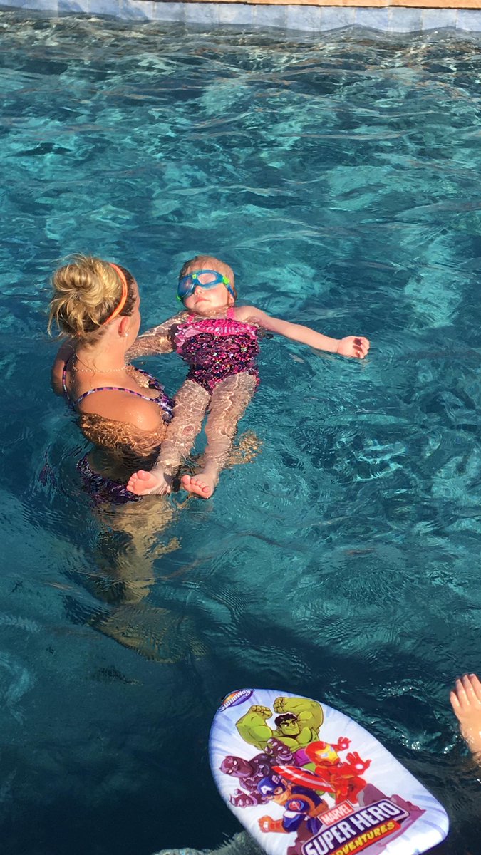 the4fergusons's tweet photo. Twins Genna and Granger are learning to float, and are showing great kicking skills. They are having fun learning to swim with @JaynieFerguson @glasersteve @GlaserJenny https://t.co/wLZqXWkIx9