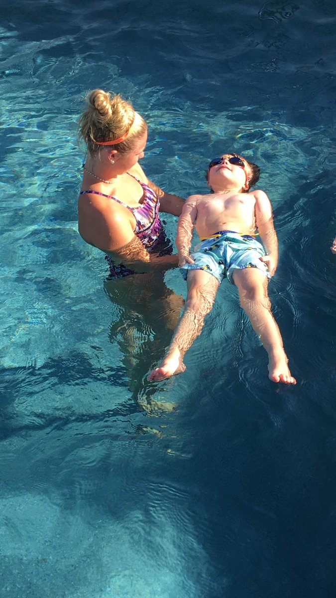 the4fergusons's tweet photo. Twins Genna and Granger are learning to float, and are showing great kicking skills. They are having fun learning to swim with @JaynieFerguson @glasersteve @GlaserJenny https://t.co/wLZqXWkIx9