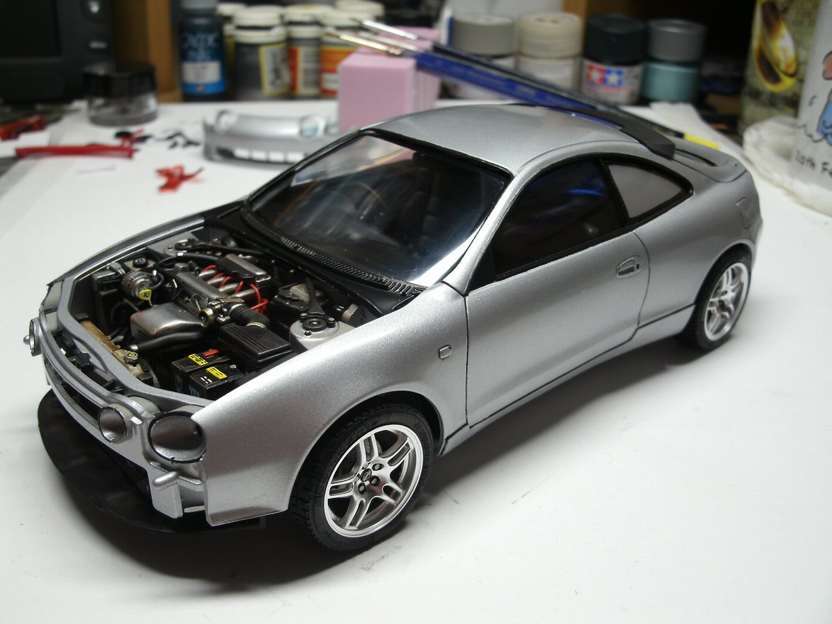 HirakawaDavid's tweet photo. A build of the Celica. The final assembly where the engine is finished off and various body parts were scratch built. I had to shave under the bonnet to stop the alternator hitting it. #HirakawaStudios #Toyota #Celica #SSIII #Tamiya #Scalemodel https://t.co/NDhUeaiO7D