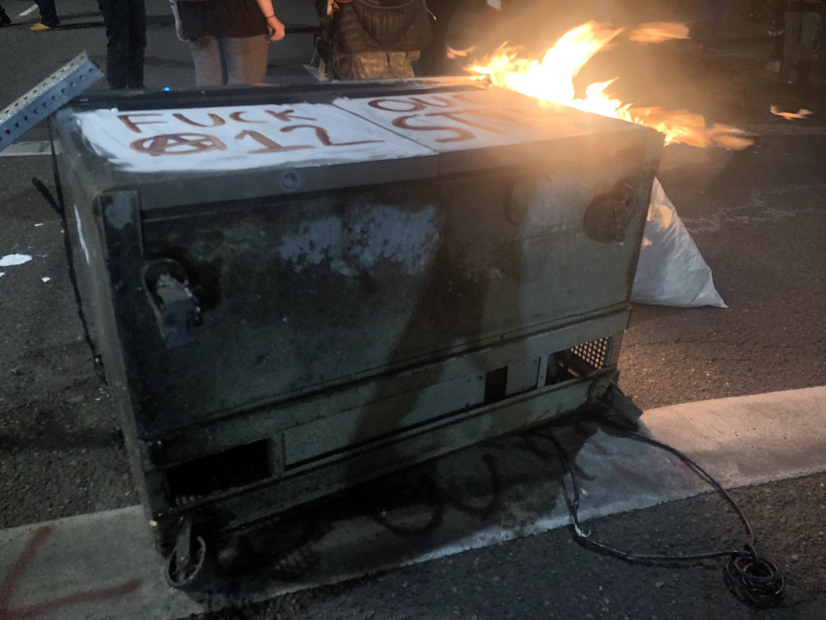 Looks like some of the baracade materials were retrieved beforehand, it is being rebuilt now. There’s also a small trash fire, some people complain about the fire not helping Black Lives Matter.  #blacklivesmatter    #pdx  #portlandoregon  #oregon  #blm  #acab  #portland  #riotribs  #CLAT