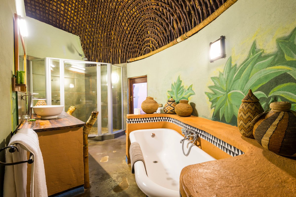Relax in the earthy ambiance of African décor, our rooms are traditional huts with luxuries amenities, including en-suite bathrooms…giving you a pleasant aha stay.

Book your stay in advance: aha.co.za/lesedi/