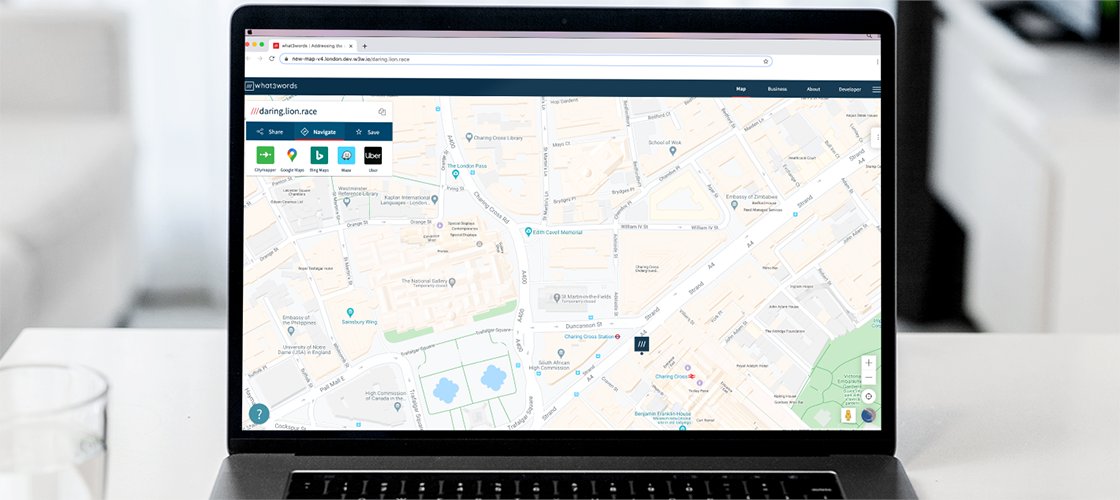 Laptop open, what3words updated map site on the screen
