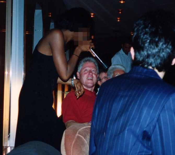 "Bill Clinton was in relaxed mood on the humanitarian trip to Africa." https://www.thesun.co.uk/news/us-news/10698533/bill-clinton-poses-with-epsteins-pimp-ghislaine-maxwell-and-a-sex-slave-on-board-private-jet-the-lolita-express/