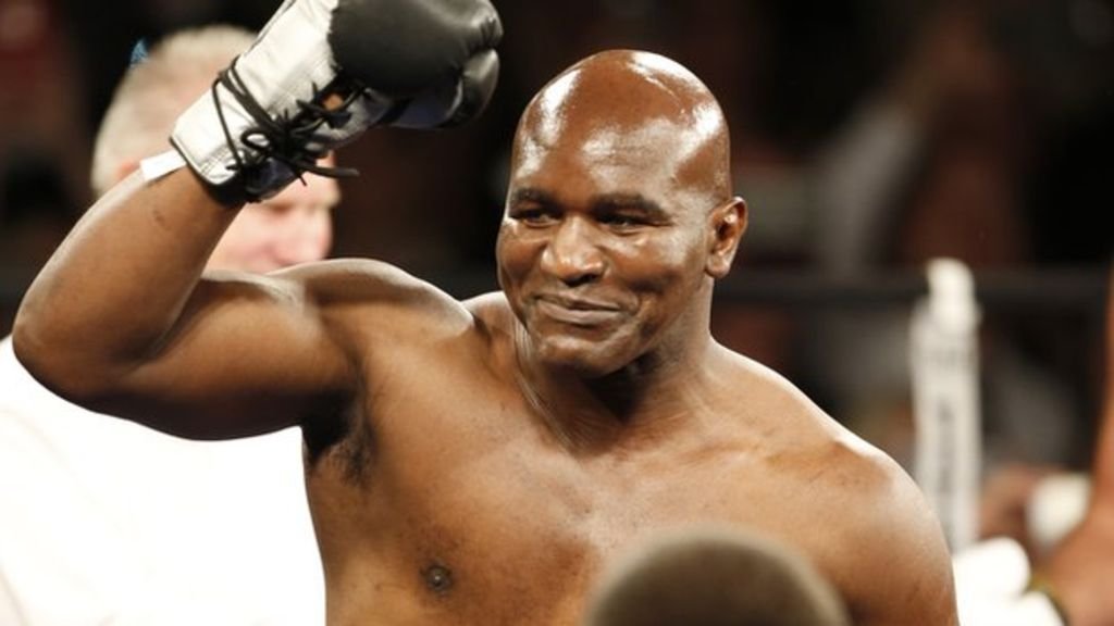 holyfield's tweet photo. My mama told me, “Son, don’t be a coward - a coward dies a thousand times but a man dies once.”  🥊 https://t.co/PWtBLYT1dW