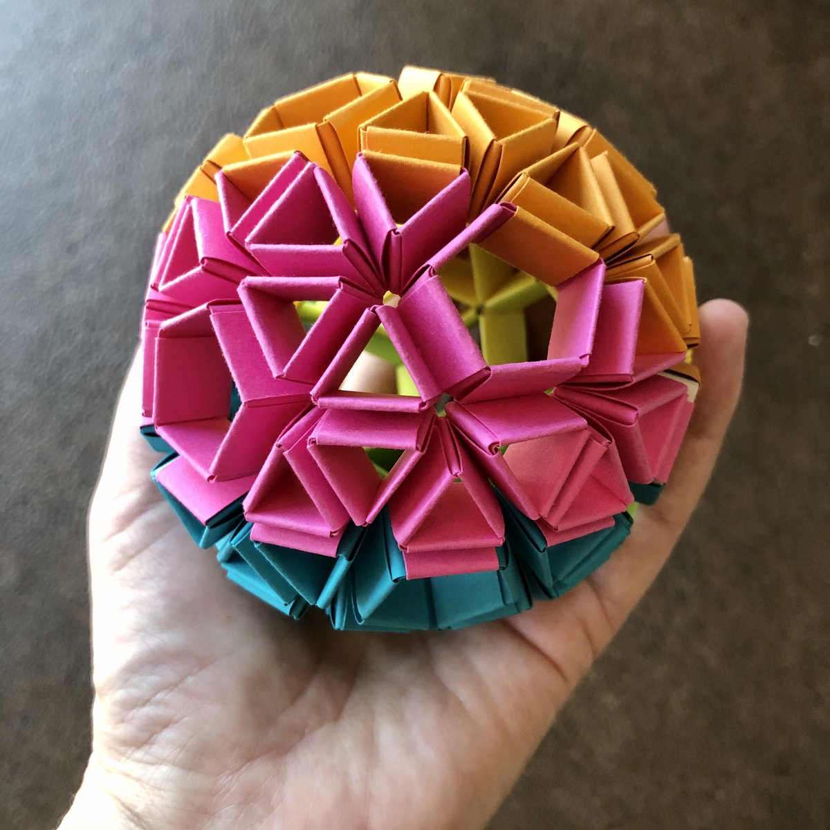 Geometiles's tweet image. My personal #MathArtChallenge has been to find a pleasing coloring scheme for the #snubdodecahedron that highlights its #chirality and #rotationalsymmetry. Sharing one of my attempts as part of  #mathphoto20. Made with paper strips, no glue. #snapologyorigami #MTBoS #iteachmath