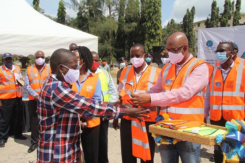 NorthernCoridor's tweet photo. NCTTCA erects a handwashing station for drivers at Miritini testing Centre and launches distribution of 10,000 masks and reflector jackets to truck drivers. @EACAffairsKenya @jumuiya @MsaPortCharter @TransportKE @RwandaInfra @UNRA_UG @transportON @RepSouthSudan @IsteebuB https://t.co/IqiLTYeRTq