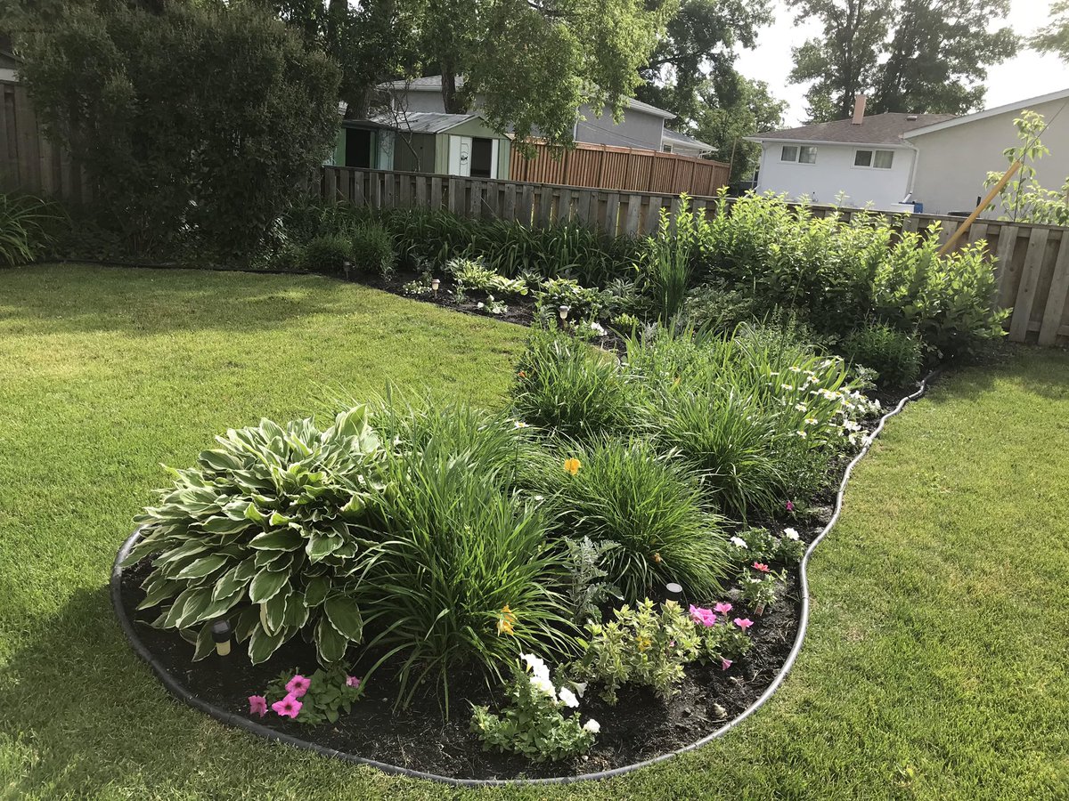 PrairieSpiritUC's tweet photo. We may not be able to worship together at the church, but we can appreciate what’s outside. A small group of gardeners have been working to fresh up and maintain our gardens. If you are out and about, consider stopping by to appreciate our gardens. https://t.co/FJLBqgo6Ng