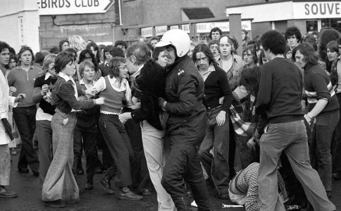 Man United fans on their travels to Cardiff City, August 1974.