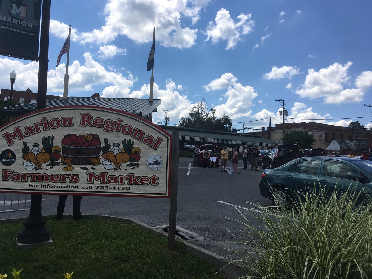 People beginning to gather at the Marion Regional Farmers Market for the Black Lives Matter/LGBTQ+ rally, scheduled to begin in a half-hour