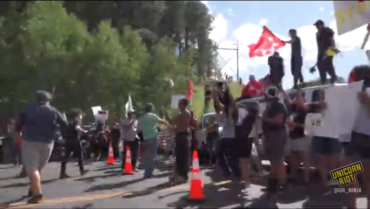 A more intensive vehicle blockade has also gone up, blocking the road to Trump’s event in South Dakota. Indigenous people gathered here are invoking their unceded rights to the land - police preparing to make arrests.We’re live:  https://www.pscp.tv/w/cc5PtzFheVFWdmRWUmdWUXB8MUJSS2pZT0FFTXB4d0s5gE0Tszzio55x0Ax9tF2T7UsTOEfJ2AWk_LdMg_4q