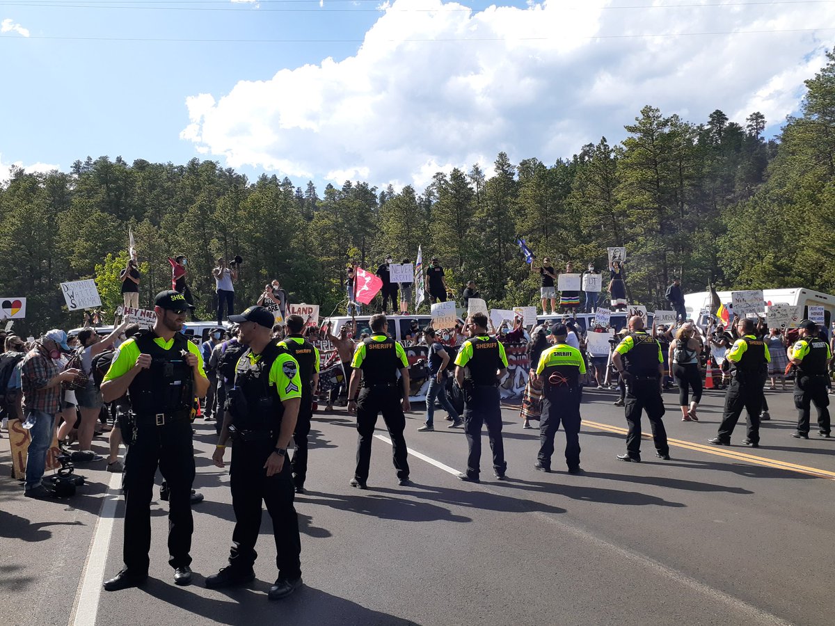 Police just announced over a megaphone that the protesters blocking the entrance to Mount Rushmore are an unlawful assembly and if protesters don't disburse, they'll be arrested. Again, zero traffic in and out of the monument.