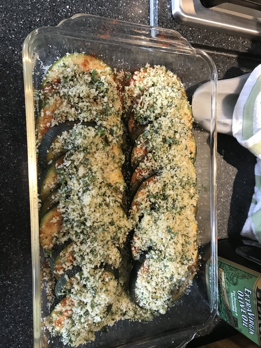 patis63's tweet photo. Zucchini from the garden topped with fresh thyme, Panko and Parmesan ready to go in the oven...#who_is_hungry https://t.co/lhgSZUP73f
