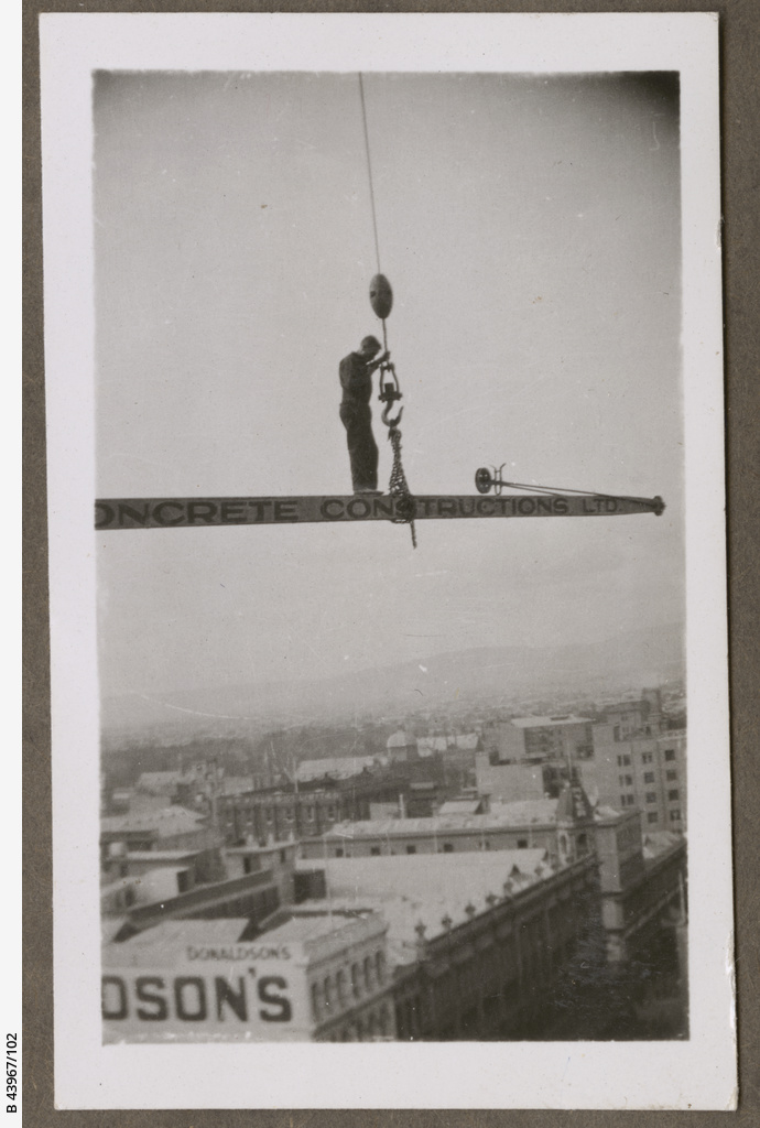 SLSA's tweet photo. I've no head for heights unlike these brave workers on the CML building, cnr King William & #Hindley St in 1934. They had a great view though! #Adelaide #SouthAustralia #HindleyStreet #KingWilliamStreet #buildings #buildingworkers #libraries #dontlookdown https://t.co/9Ec5liuiiD https://t.co/fwJQhKUQhi