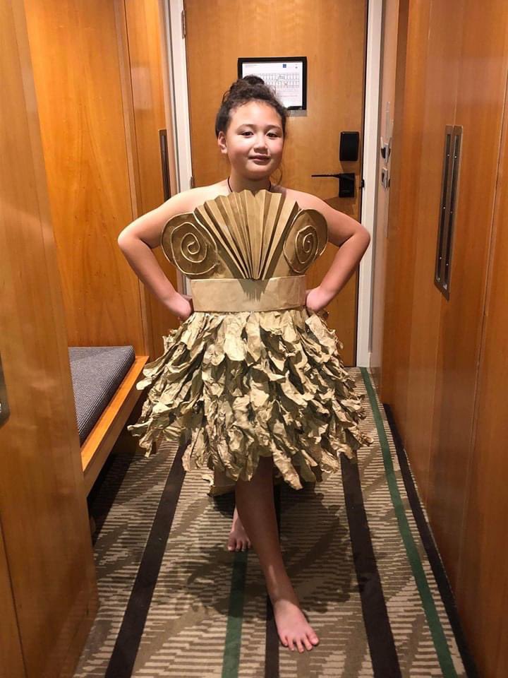 KiwiDiva's tweet photo. There is a lot of waste in iso - our food comes in so much packaging. Teau Manea Miriama Singer (9) is in quarantine with her brother and mother. This is what she designed and made in their hotel room from the bags their food got delivered in – upcycled fashion. Wow!

*not my kid https://t.co/w3UEaSONaW