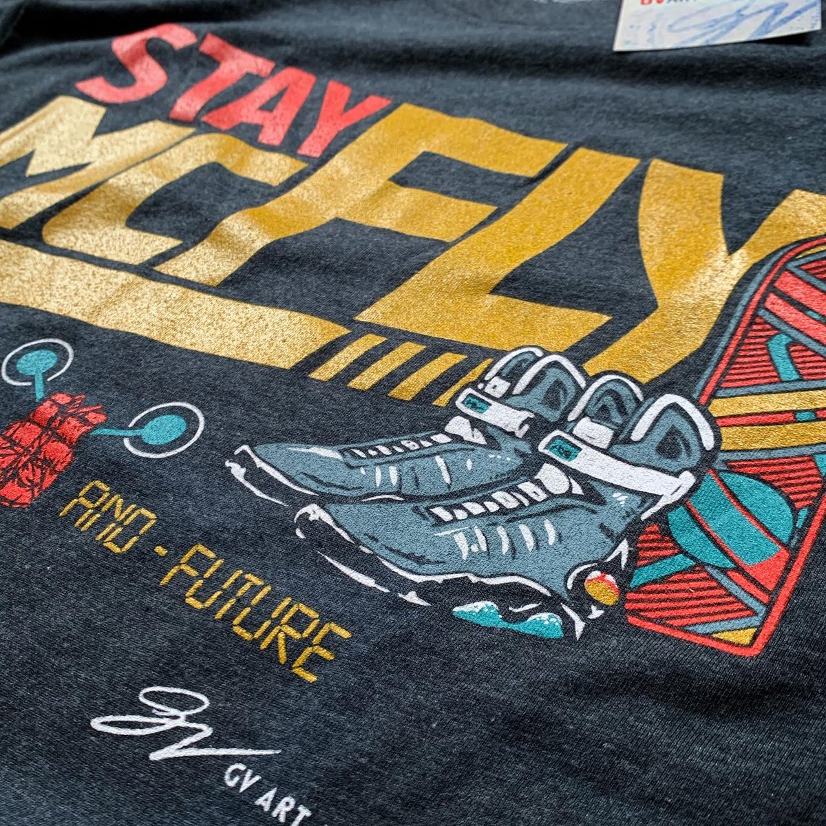 GVartwork's tweet photo. Exactly 35 years ago today, one of the most iconic movies of all time released!

We’ve had requests for years. RT if you think it’s finally time to bring this classic shirt of ours Back From The Future too! 👀 https://t.co/hkdTU0d6Cv