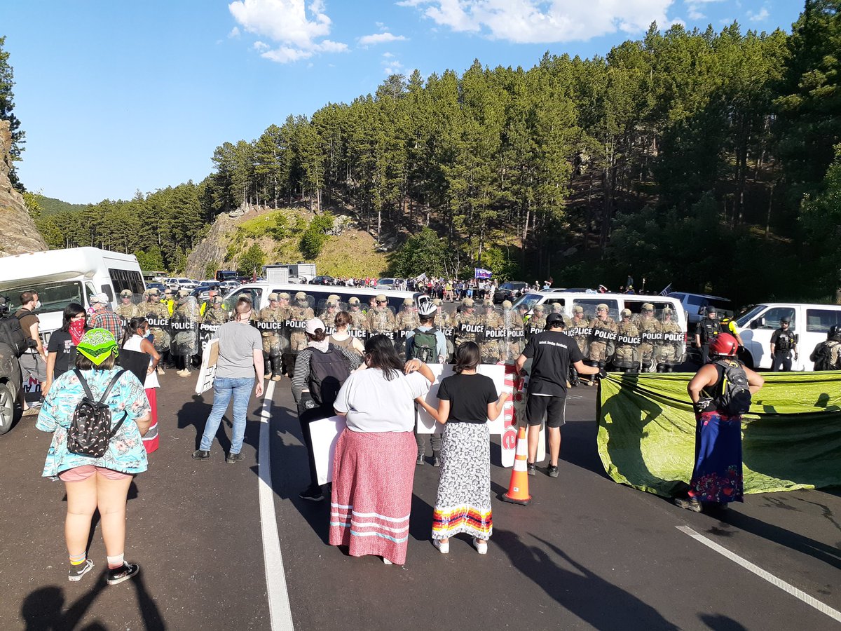 Protesters who remain are now between two lines of riot armored national guard and police.