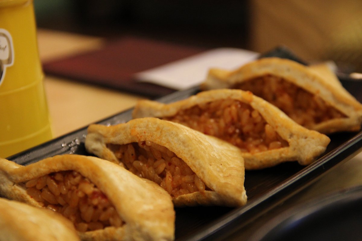 We ordered almost every North Korean dish on the menu -- this is dubu bap, or tofu rice, which - as it sounds - is fried tofu stuffed w/rice. The pub served it w/spicy, seasoned rice inside, but acc to Kim, in NK, the rice is plain white rice served w/a separate spicy paste.