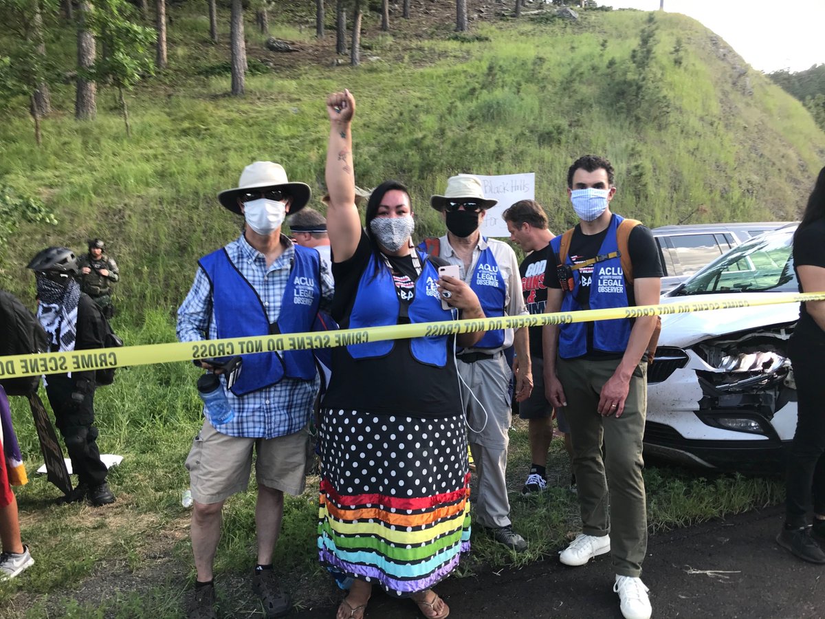 ACLUSouthDakota's tweet photo. Indigenous justice organizer Candi Brings Plenty and her team of legal observers are documenting any incidents of police misconduct or violations of constitutional rights at the protest outside of Keystone, S.D., today before President Trump’s visit to Mount Rushmore. https://t.co/dW5cqOjatZ
