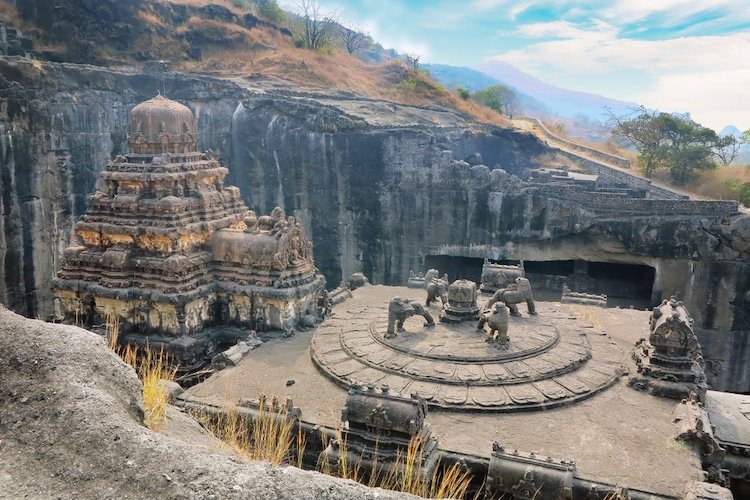If we see any other caves of the world, it is made by cut from outside to inside, which is 'cut-in monolith technique'.But to make Kailash Temple, the rock has been cut from top to bottom, which is called 'cut-out monolith technique'. Which is very difficult & complex process.