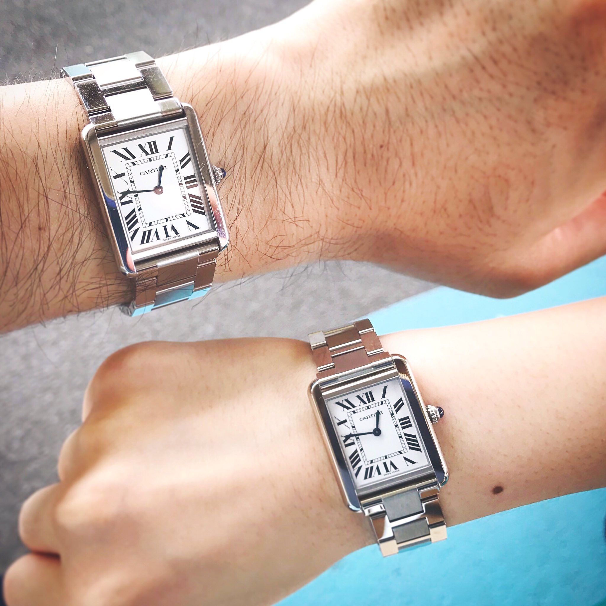 cartier tank on wrist