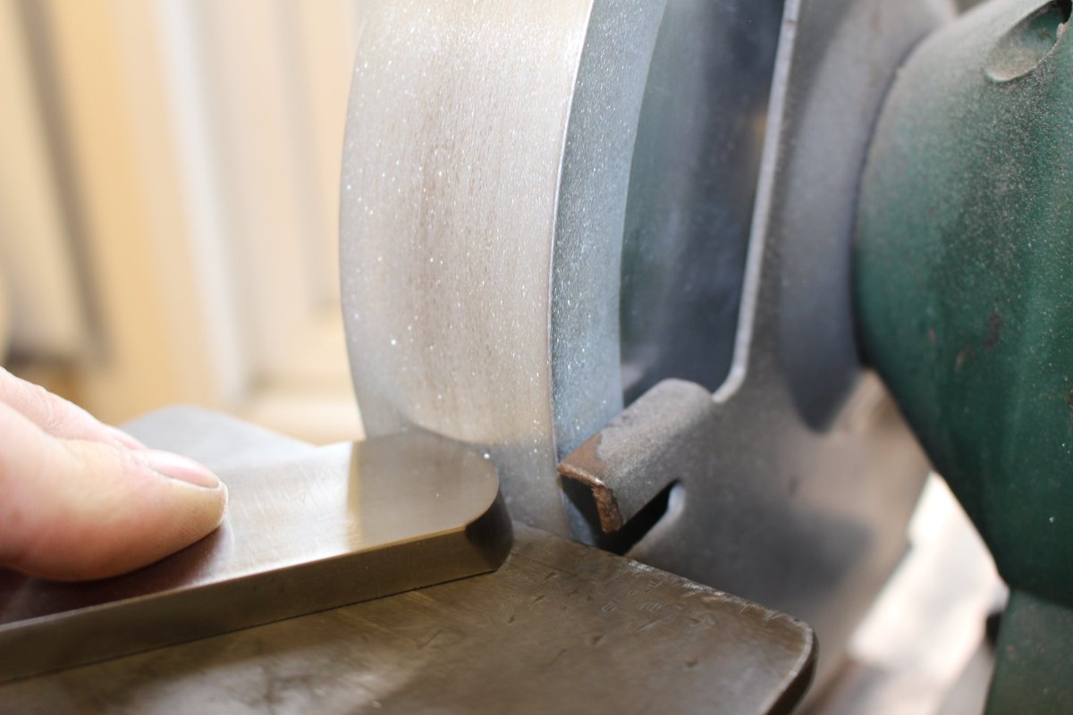 Step 8: Regrind often...here a conventional round-nosed scraper is ground upside down...the way they should always have been ground...to draw the burr off the cutting edge. Note the low position of the rest to allow the CBN wheel to safely grind at the correct angle