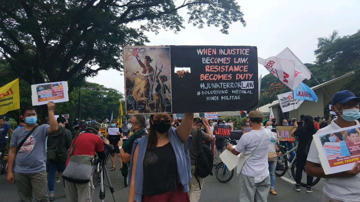 altermidya's tweet photo. Groups gather in UP Diliman today for an indignation rally as President Rodrigo Duterte signed the controversial Anti-Terror Bill into a law yesterday. They vowed to continue to fight to #JunkTerrorLaw. https://t.co/ZdyH7u1XTj