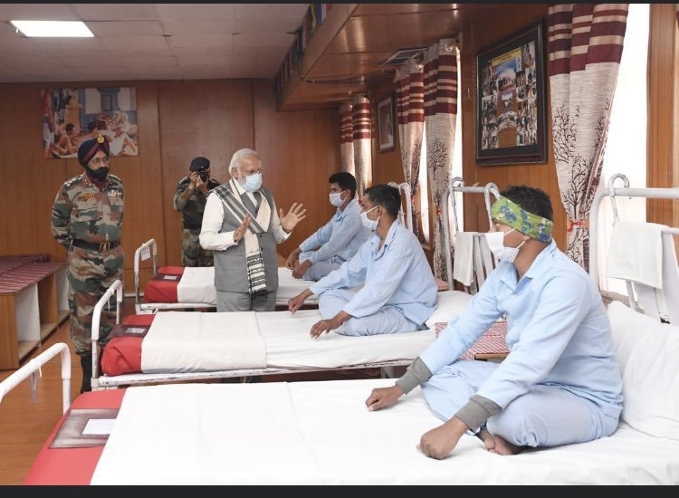 HindustaniGeek's tweet image. Why are our war soldiers being treated in a conference hall, why are there no medical equipments beside the beds. 
Or is this just a setup for Modi&apos;s Photoshoot(Soldiers face says so too)? Why is Modi using our army to hide behind? #modiweakestpmever