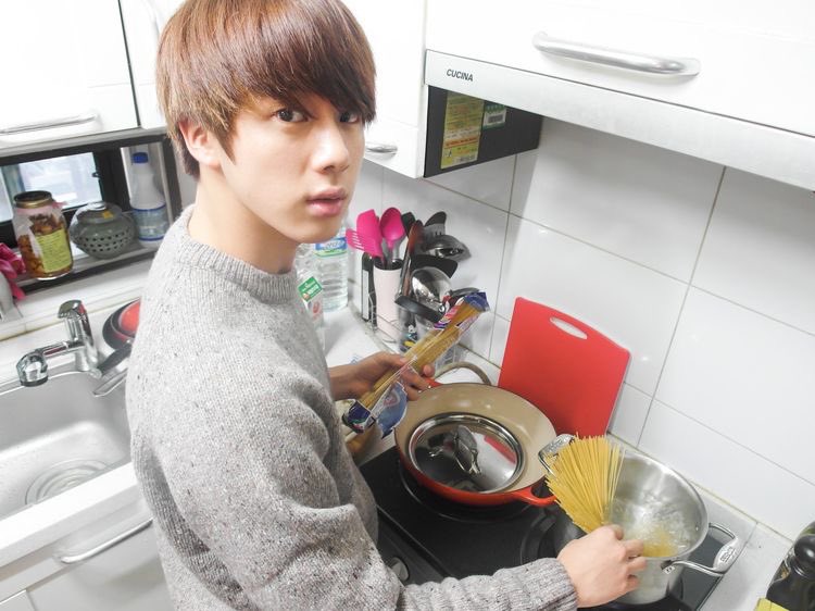 Standing or on the floor, the kitchen is his