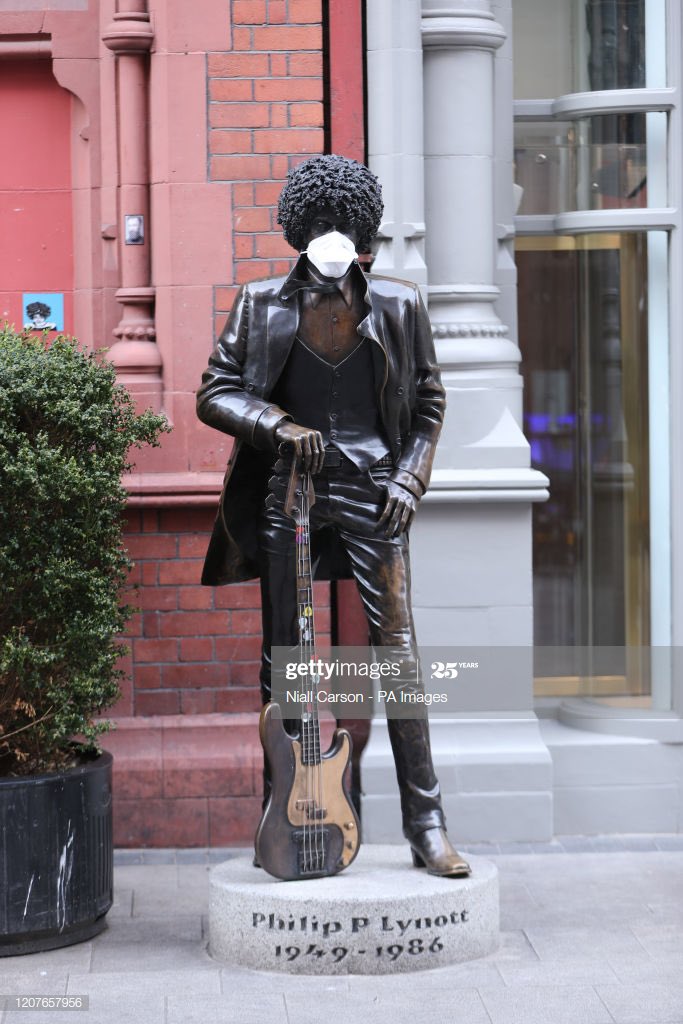 And here’s a photo of Phil Lynott’s statue in Dublin, showing you to wear your masks and socially distance in these strange times due to COVID-19.