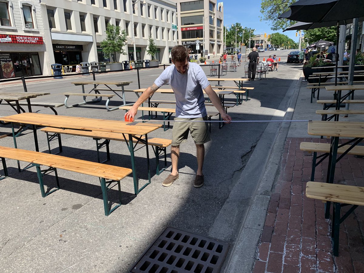 CamGuthrie's tweet photo. @BrothersBrewery and other businesses prepping the tables to be six feet apart for @DowntownGuelph #Guelph’s first #DiningDistrict this weekend! #OpeningSafely #SupportLocal #Guelph! #Jobs https://t.co/FzyFU8WDNs