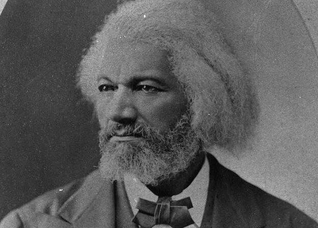 A black and white photograph of Frederick Douglass. 