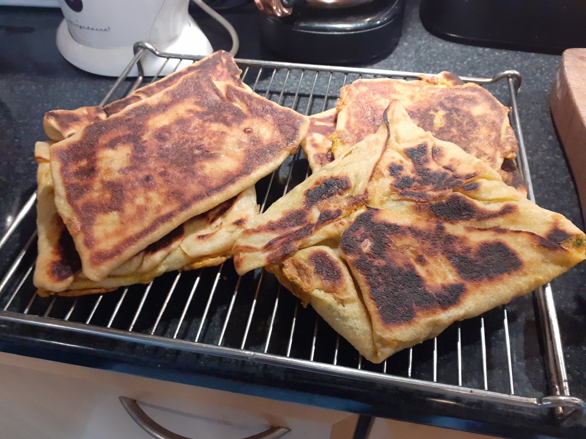 Malaysian feast this week. Spicy sour cod, okra and cherry tomato stew. Nyonya chicken curry. Roti murtabak. Prawn karipap (incredible two-dough curry puffs, could eat forever)